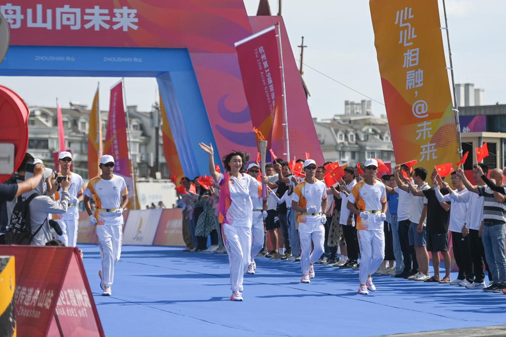 杭州亞運會｜“薪火”凝聚榜樣力量――亞運火炬手速寫(圖1)
